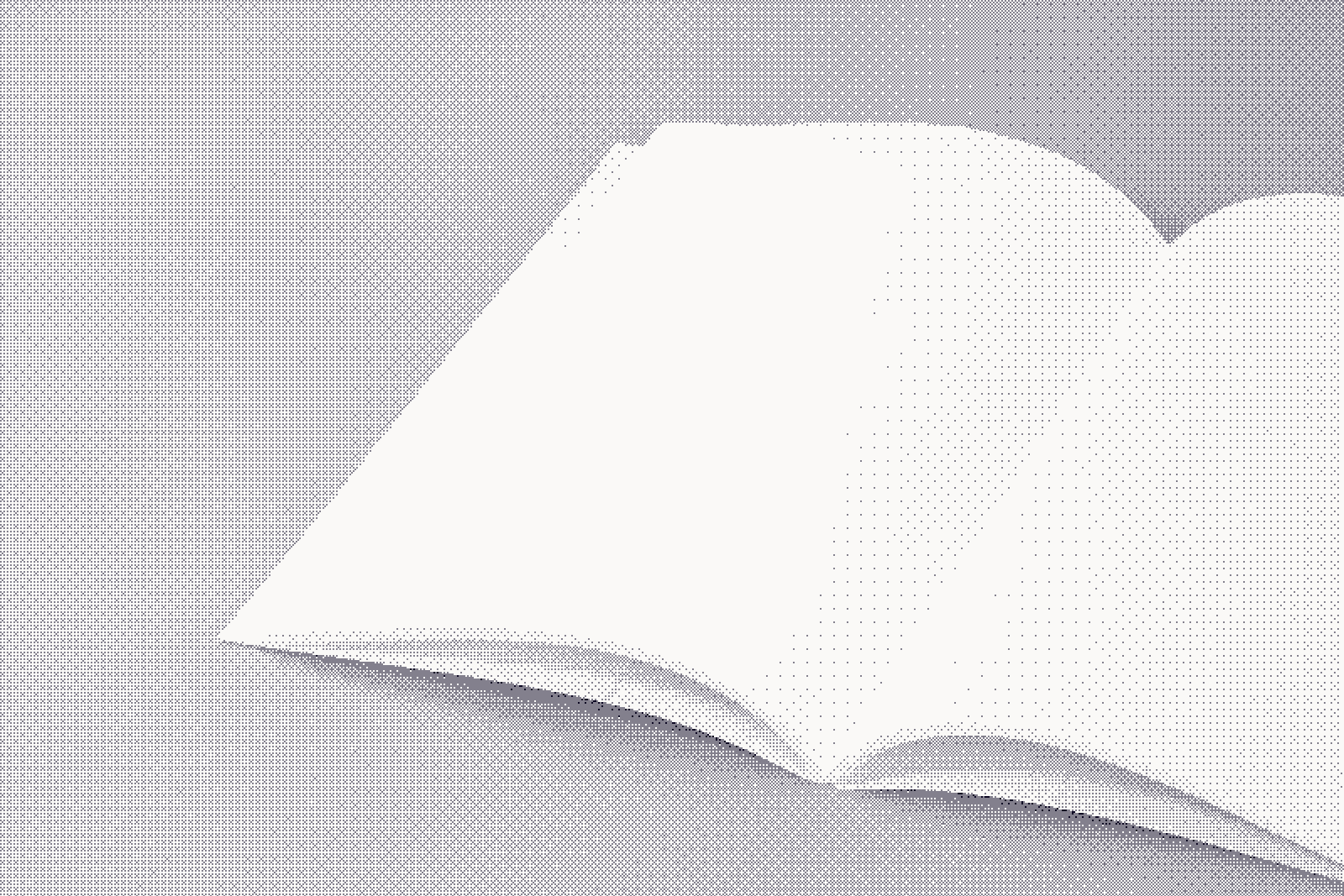 An open notebook lying blank and unmarked on a plain grey surface